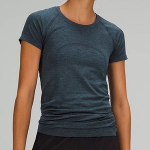 2.0 short sleeve swiftly tech, color true navy/iron, size 8